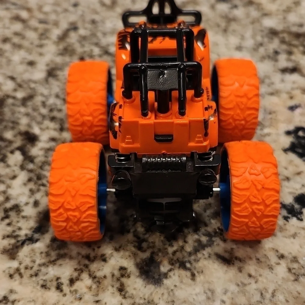Jeep monster truck reve up car orange black